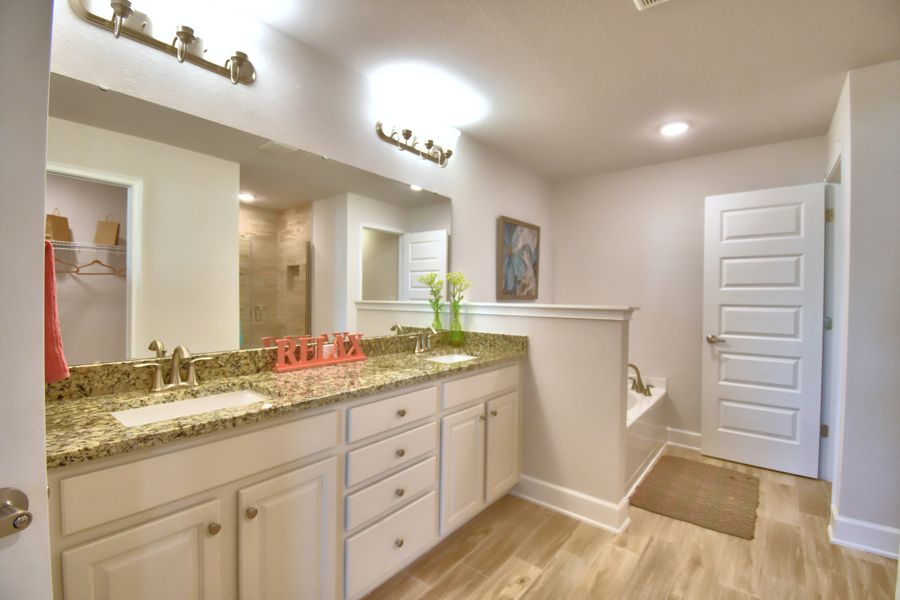 Furnished interior in a model home at Citrus Landing in Davenport (Image 30).