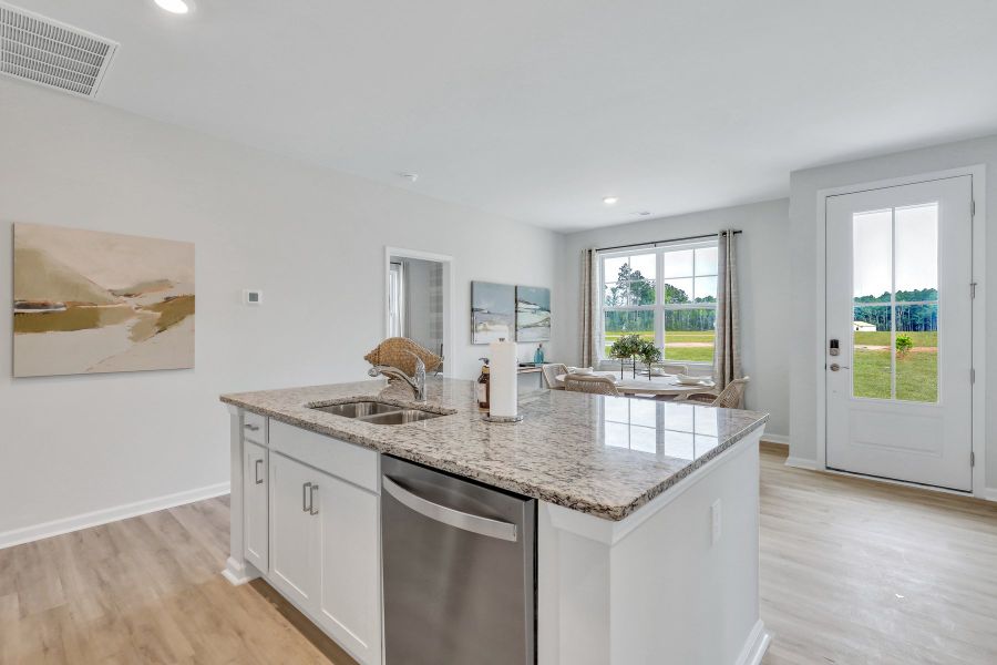 Furnished interior in a model home at Westbrook Retreat Villas at Savannah Quarters in Pooler (Image 17).