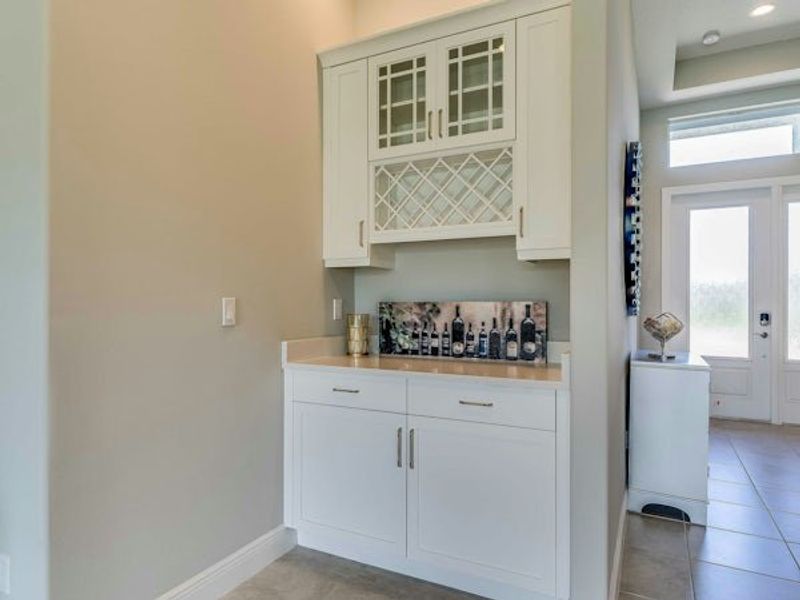 Furnished interior in a model home at High Pointe in Vero Beach (Image 61).