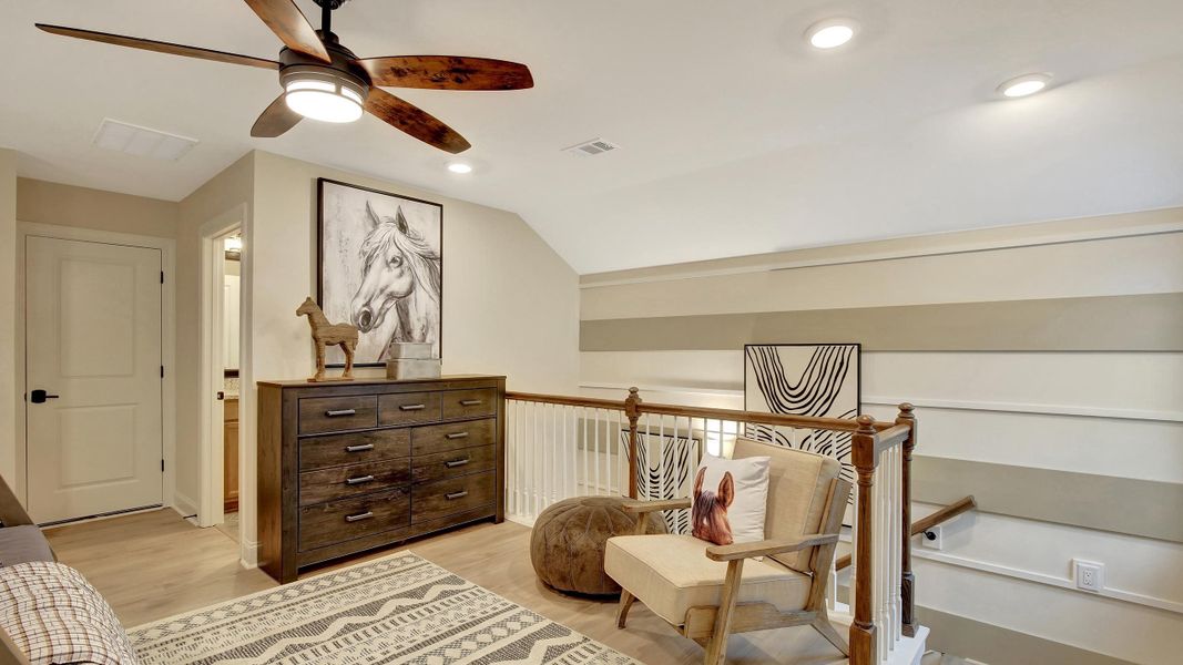 Furnished interior in a model home at Salt Grass at Ward Creek in Panama City Beach (Image 7).