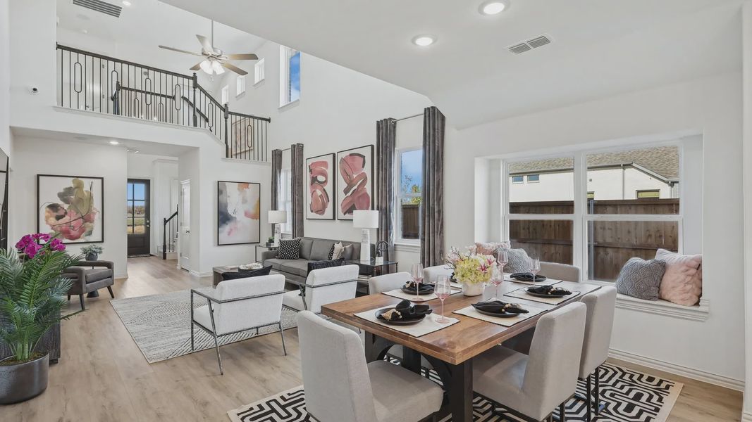 Revel in high ceilings and expansive windows in Bel Air Village's exquisite living-dining space.