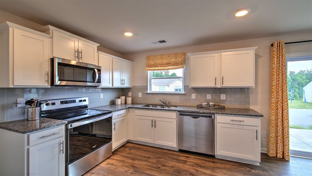 Furnished interior in a model home at Virginia Commons in Arden (Image 10).
