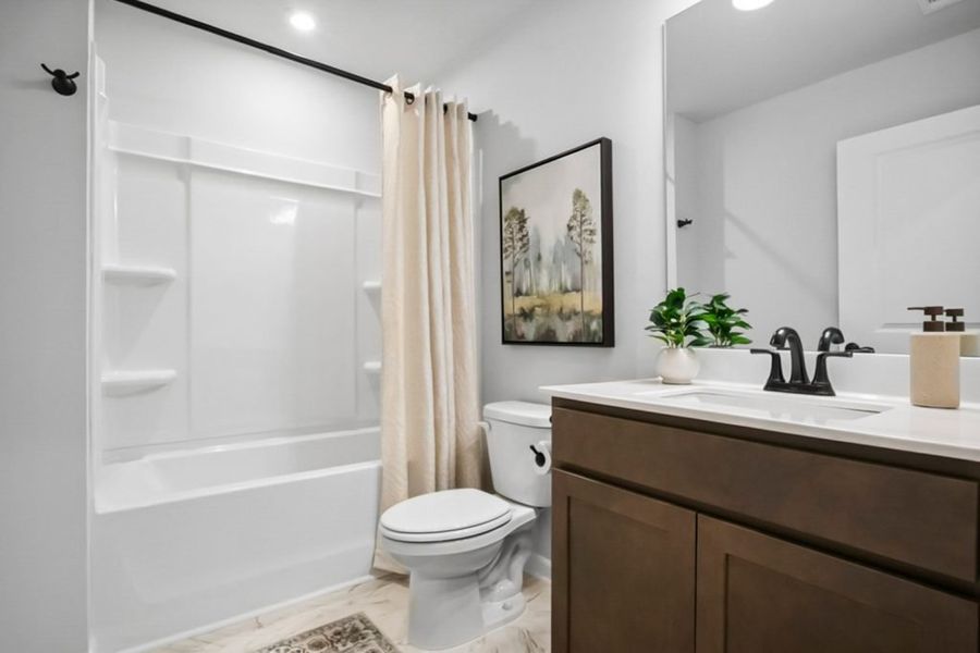 Furnished interior in a model home at Silver Leaf in Dawsonville (Image 24). Furnished interior in a model home at Silver Leaf in Dawsonville (Image 24).