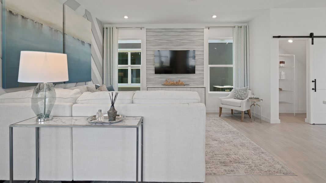 Trinity Place Staged Model Ambersweet Living Area by DRB Homes in Saint Cloud FL Trinity Place Staged Model Ambersweet Living Area by DRB Homes in Saint Cloud FL