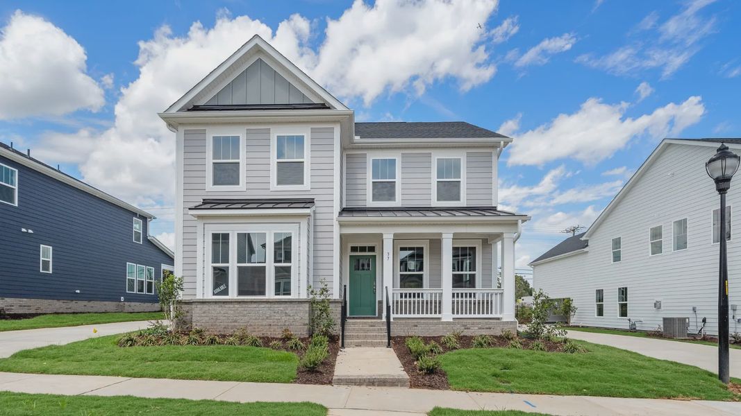 Front exterior of a home in the The Grove at Unity community, located in Greenville, SC (Image 3).