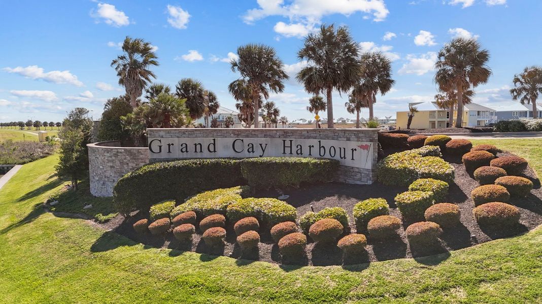 Entrance to the Grand Cay Harbour community in Texas City, TX, featuring signage and landscaping (Image 2). Entrance to the Grand Cay Harbour community in Texas City, TX, featuring signage and landscaping (Image 2).