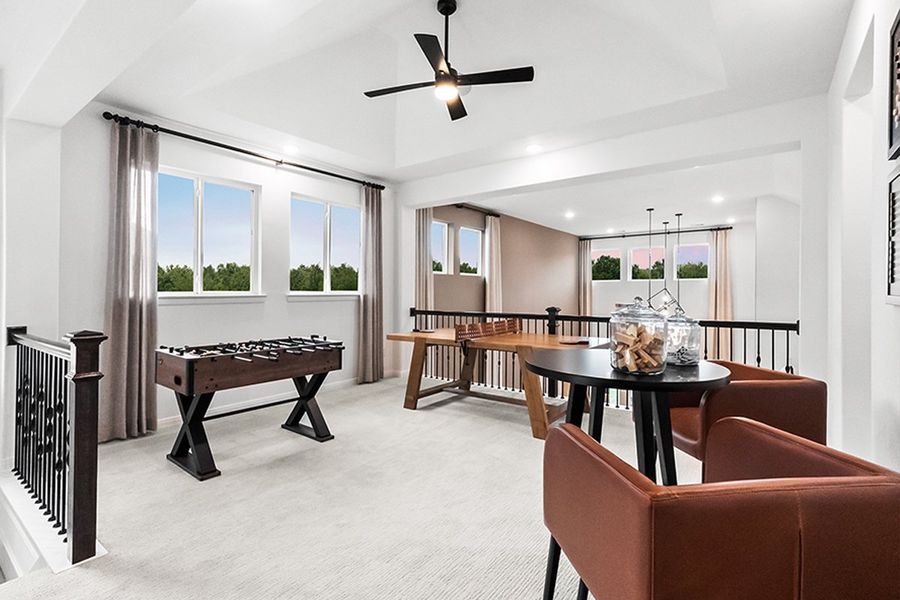 Furnished interior in a model home at The Reserve at Spiritas Ranch in Little Elm (Image 10).