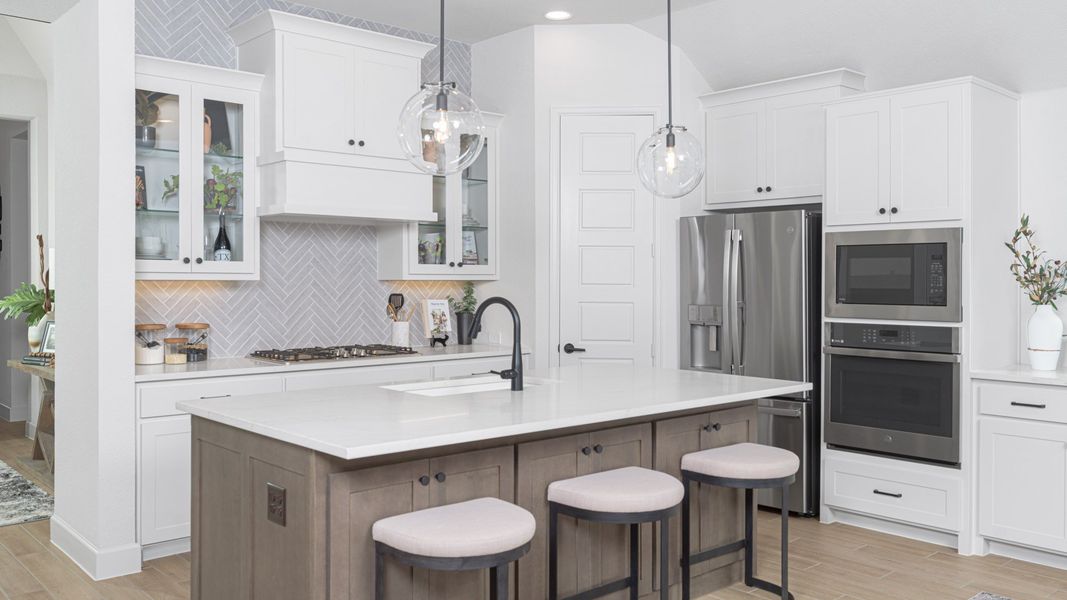 Furnished interior in a model home at Walsh Ranch 60' in Aledo (Image 24).