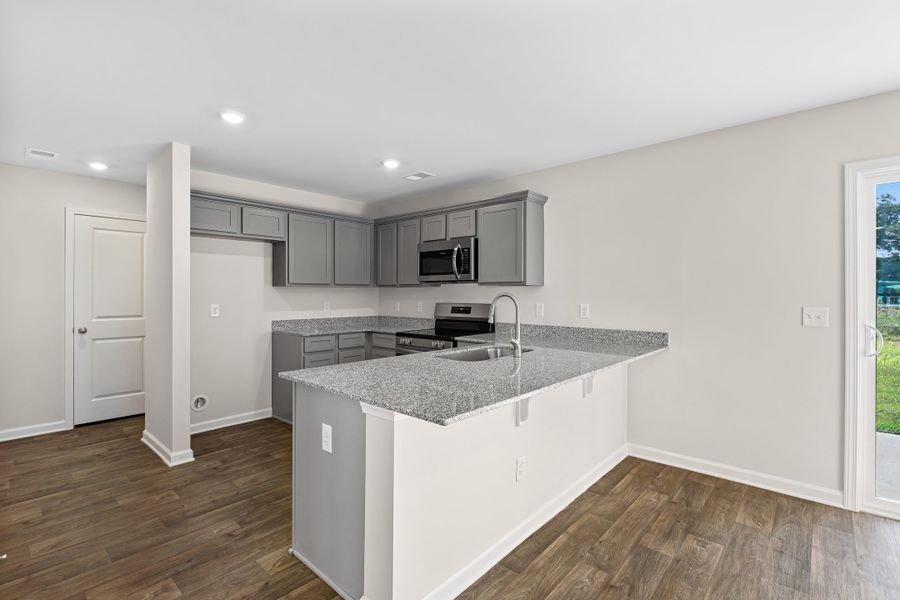 Furnished interior in a model home at South Welcome in Greenville (Image 13).