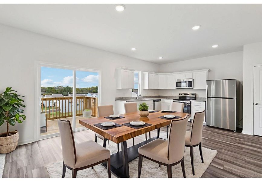 Furnished interior in a model home at The Summit at Carters Station in Columbia (Image 4).
