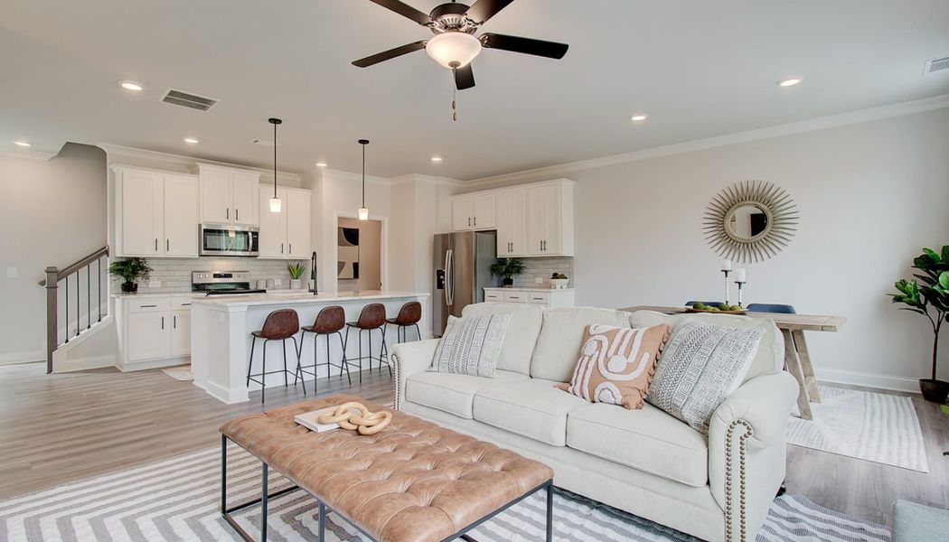 Furnished interior in a model home at Millstone at Mundy Mill in Gainesville (Image 8). Furnished interior in a model home at Millstone at Mundy Mill in Gainesville (Image 8).