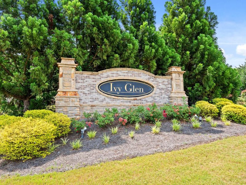 Entrance to the Ivy Glen community in Perry, GA, featuring signage and landscaping (Image 2). Entrance to the Ivy Glen community in Perry, GA, featuring signage and landscaping (Image 2).