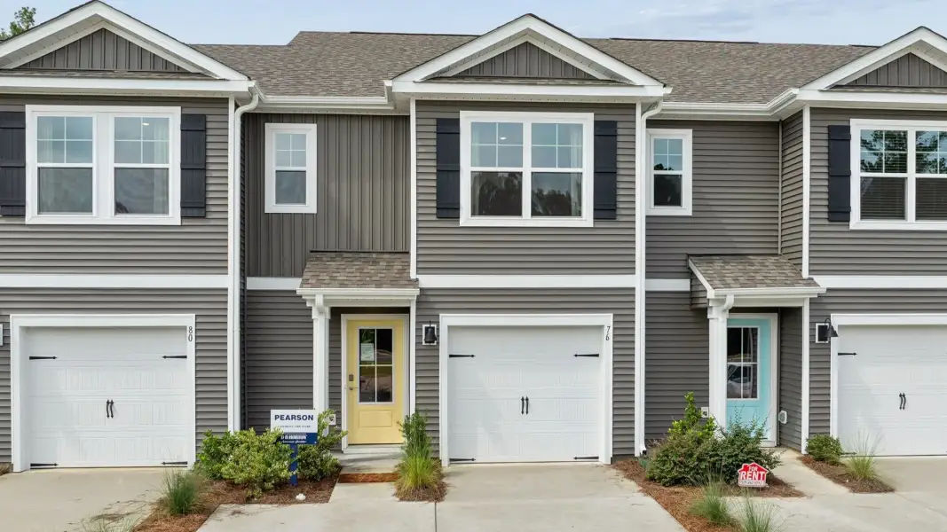 Front exterior of a home in the The Willows at Blake Farm EXP community, located in Wilmington, NC (Image 28). Front exterior of a home in the The Willows at Blake Farm EXP community, located in Wilmington, NC (Image 28).