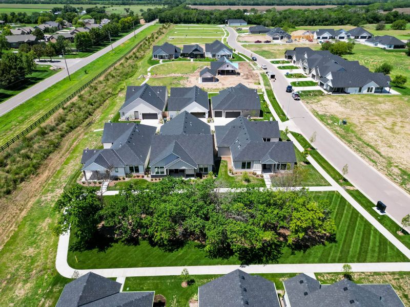 Aerial view of the The Courtyards at Jacobs Farm community in Wichita, KS, showing layout and nearby surroundings (Image 16). Aerial view of the The Courtyards at Jacobs Farm community in Wichita, KS, showing layout and nearby surroundings (Image 16).