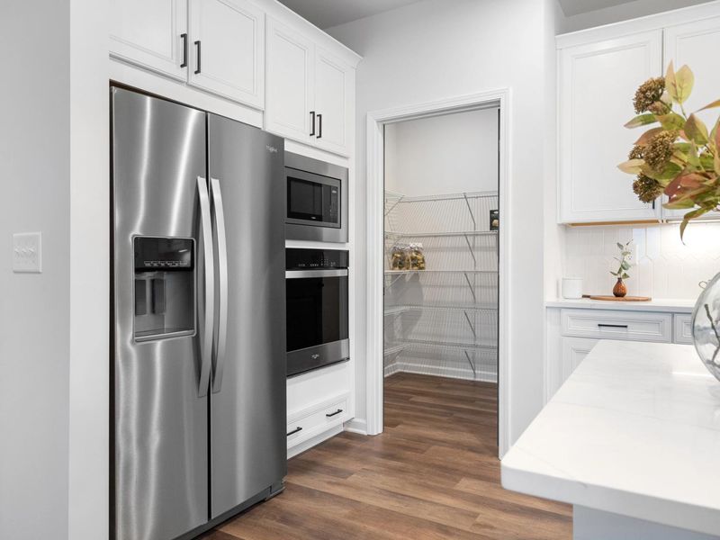 Furnished interior in a model home at Kelly Preserve in Loganville (Image 21).