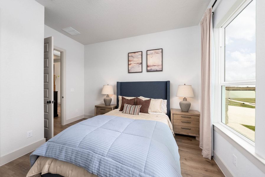 Furnished interior in a model home at Weltner Farms 60’s in New Braunfels (Image 37).