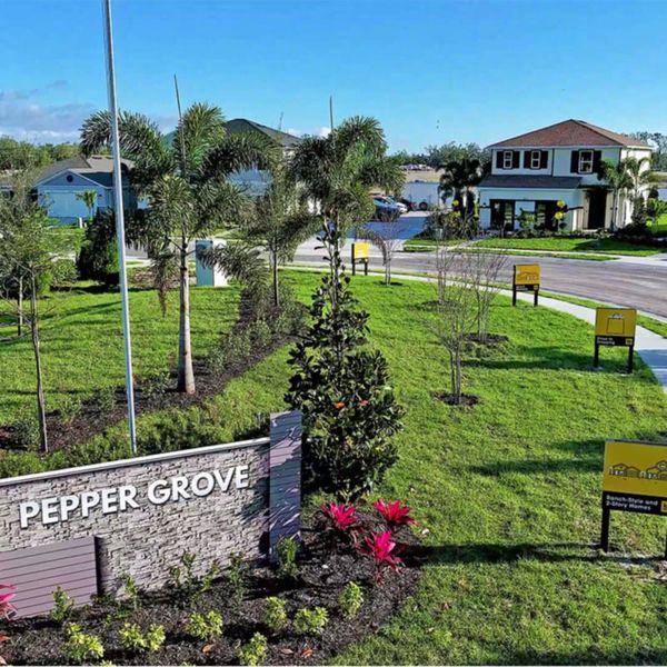 Entrance to the Pepper Grove I community in Palmetto, FL, featuring signage and landscaping (Image 9). Entrance to the Pepper Grove I community in Palmetto, FL, featuring signage and landscaping (Image 9).