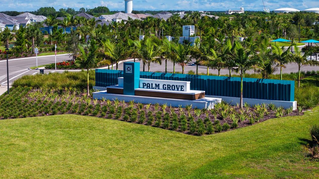 Entrance to the Palm Grove community in Bradenton, FL, featuring signage and landscaping (Image 2).