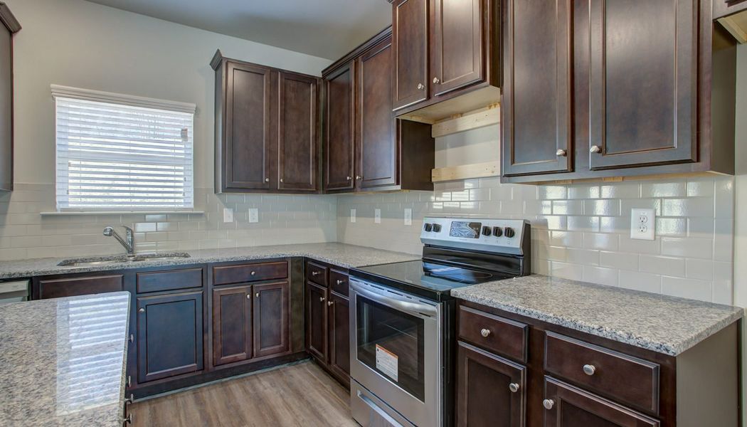 Furnished interior in a model home at North Village in Rydal (Image 8).