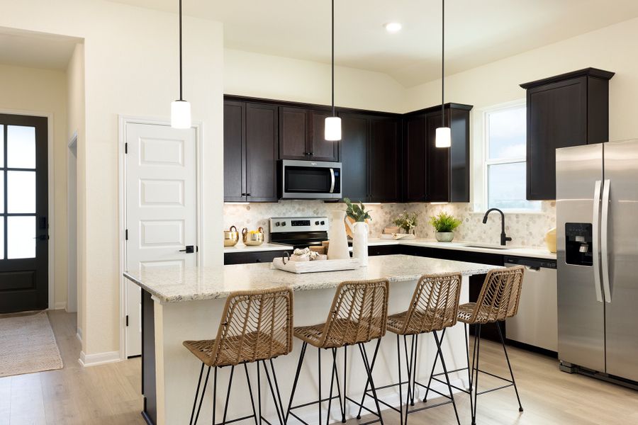 Furnished interior in a model home at Saddle Creek Ranch in Cibolo (Image 6).