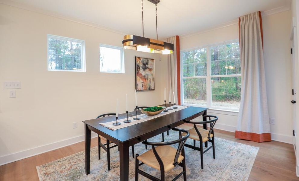 Furnished interior in a model home at Enclave at Riverdale in Huntersville (Image 18).