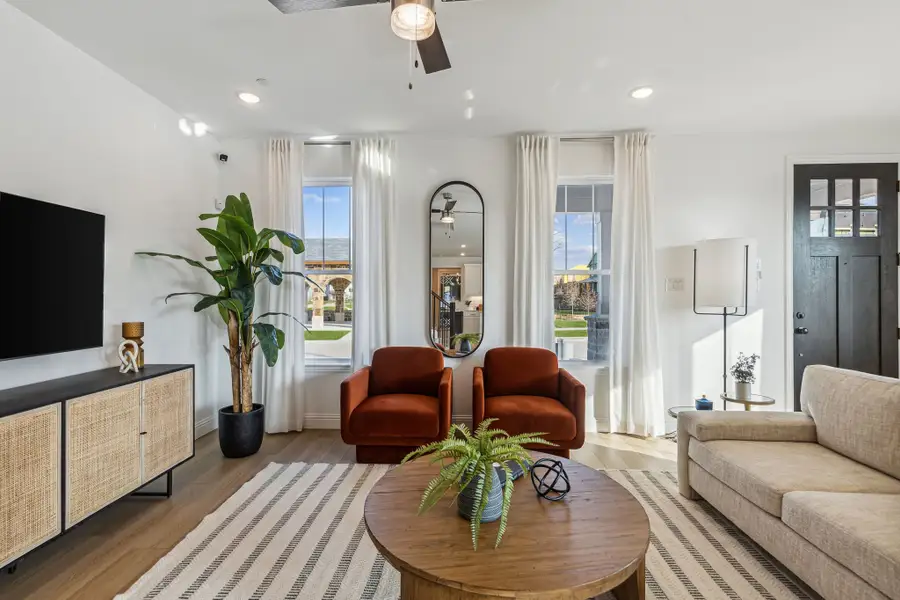 Furnished interior in a model home at Village on Main Street in Frisco (Image 9).