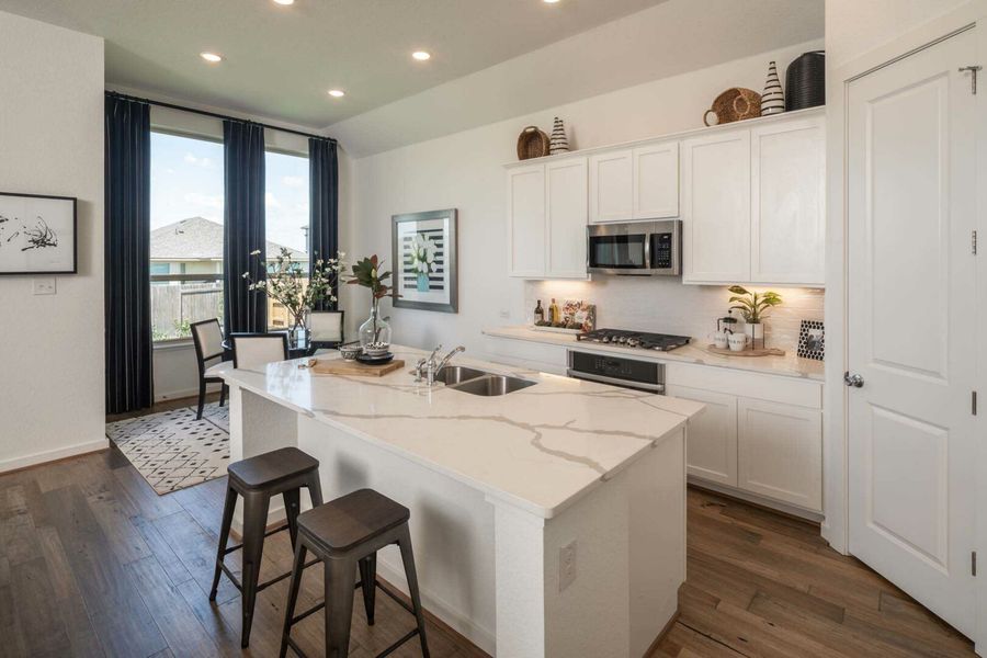 Furnished interior in a model home at Crosswinds: 60ft. lots in Kyle (Image 17).