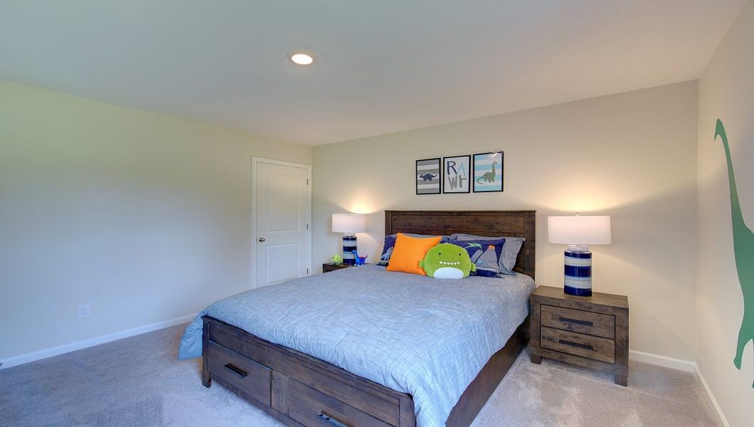 Furnished interior in a model home at Tap Root Farms in Fletcher (Image 30).