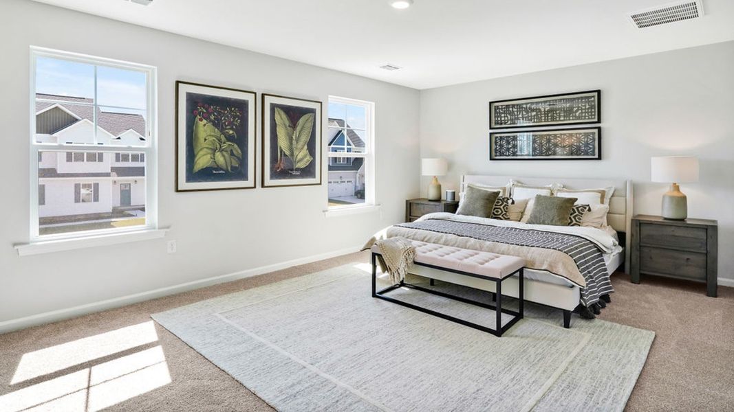 Furnished interior in a model home at Bella Point in Bolivia (Image 16).