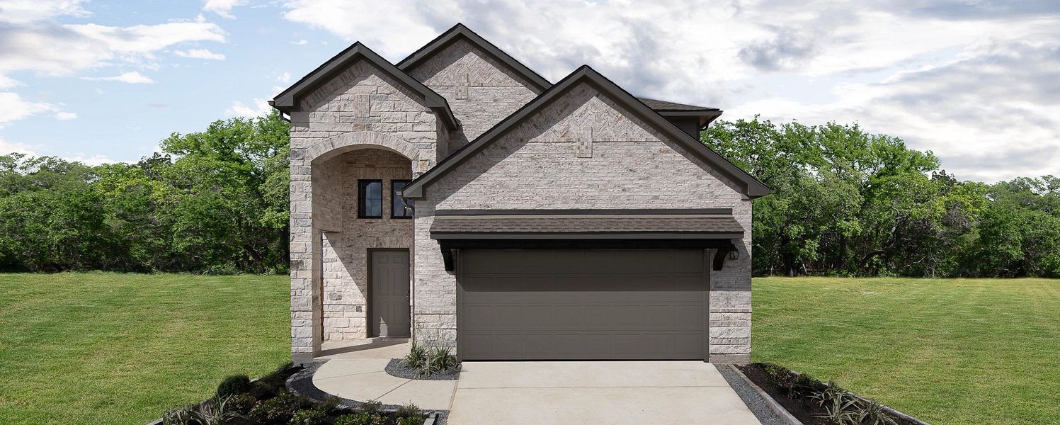 Front exterior of a home in the Emory Glen community, located in Magnolia, TX (Image 1).