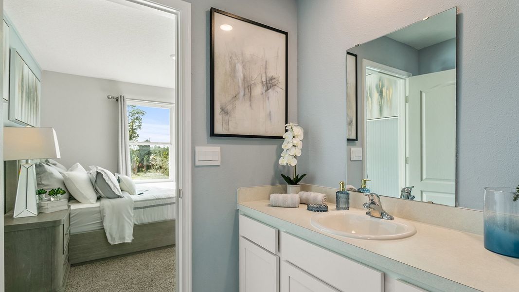 Furnished interior in a model home at Stokes Landing Express in St. Augustine (Image 17).