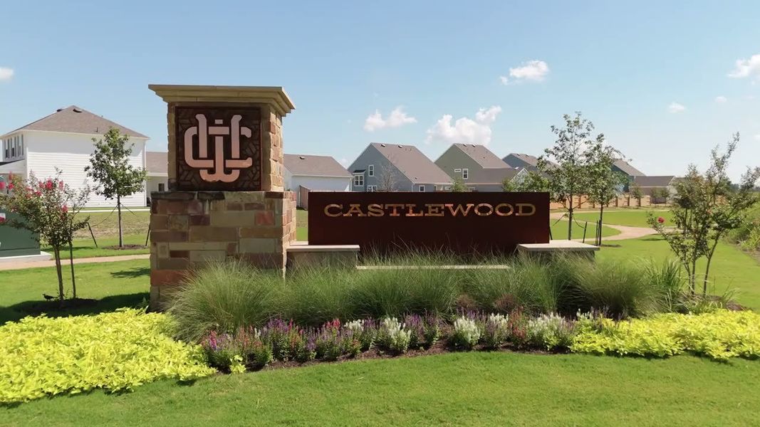 Entrance to the Castlewood community in Taylor, TX, featuring signage and landscaping (Image 2).