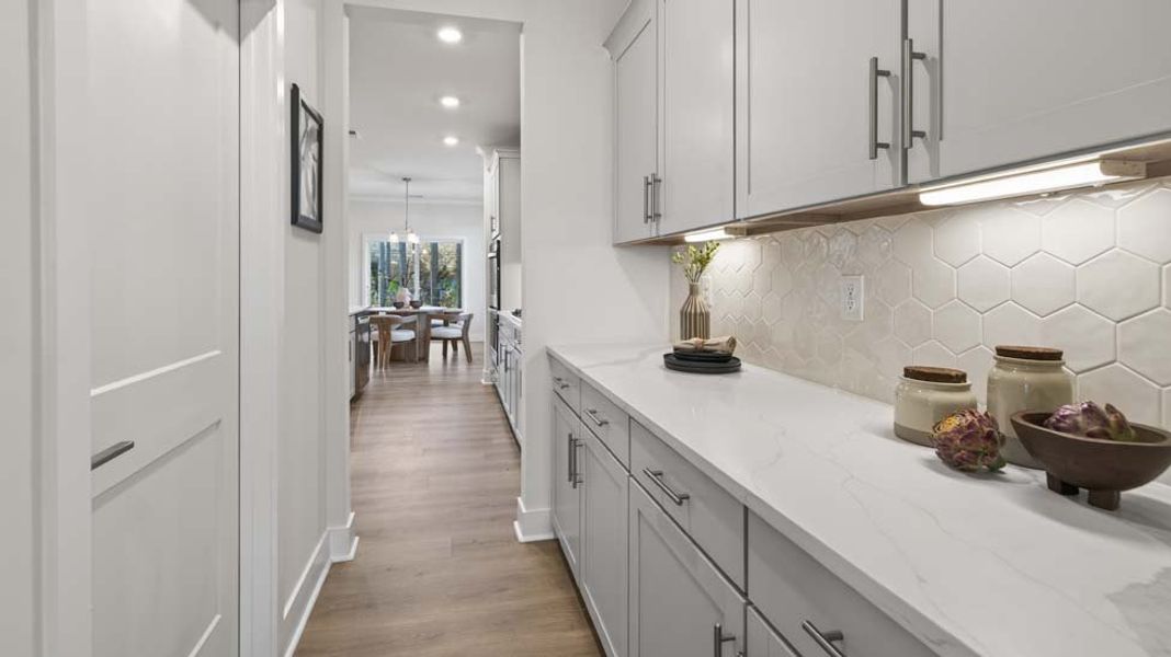 Furnished interior in a model home at Oak Grove Hill in Huntersville (Image 4). Furnished interior in a model home at Oak Grove Hill in Huntersville (Image 4).