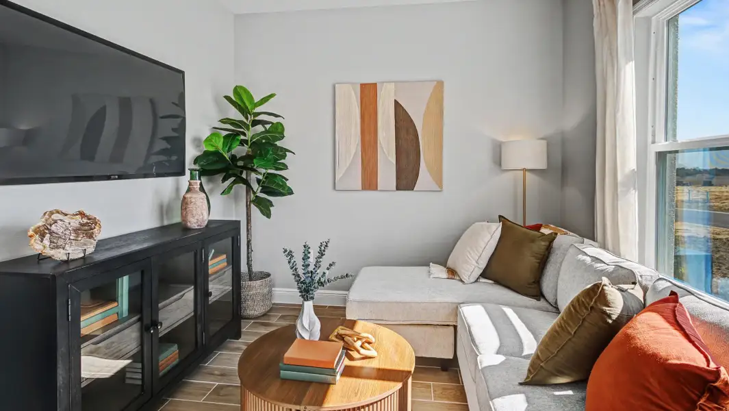 Furnished interior in a model home at Villa Pass in Groveland (Image 8).