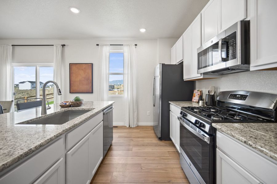 Furnished interior in a model home at The Glen in Colorado Springs (Image 15).