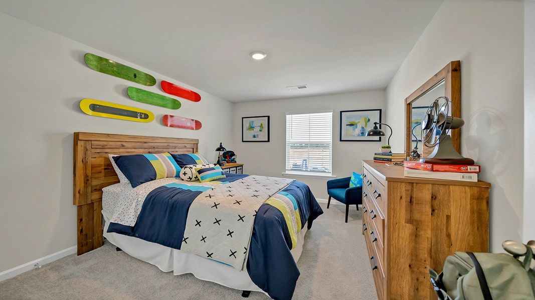 Furnished interior in a model home at Hunter's Branch in Hopkins (Image 27).