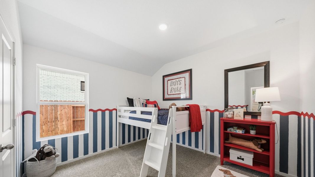 Furnished interior in a model home at Sunterra in Katy (Image 38).