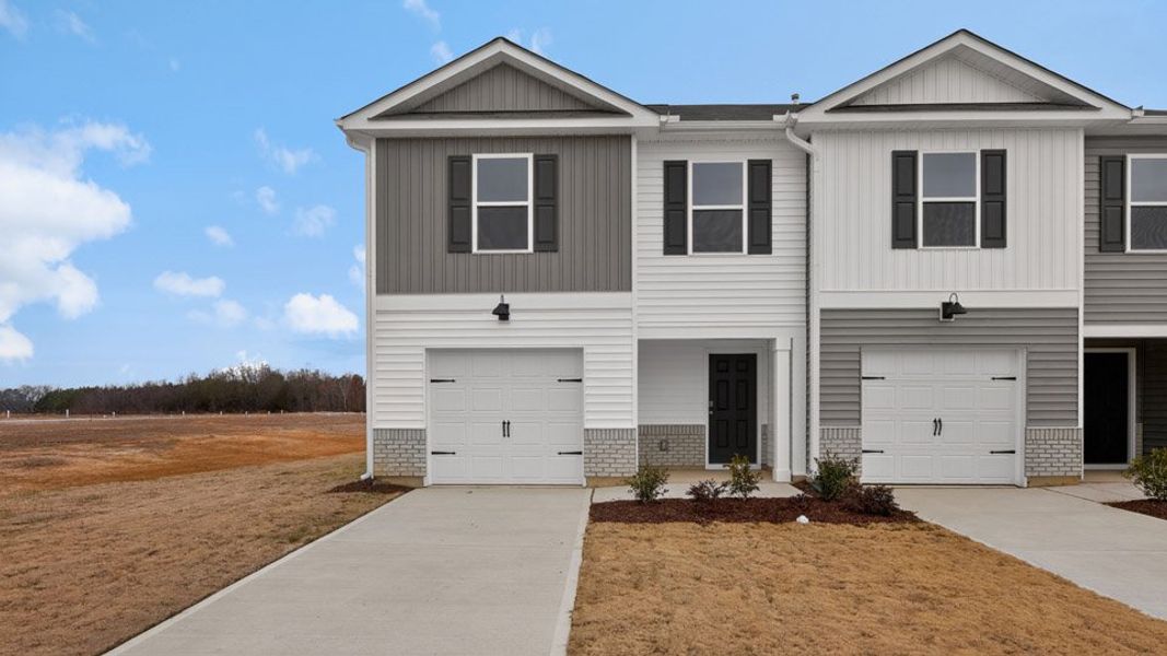 Front exterior of a home in the The Townes at Honeycutt Oaks community, located in Angier, NC (Image 29).