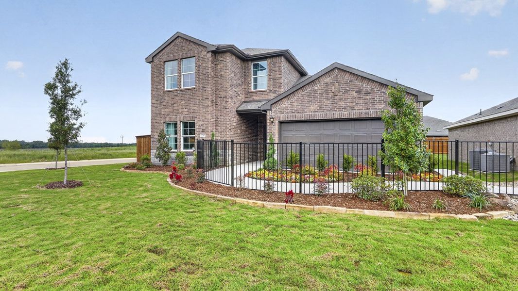 Front exterior of a home in the Forestbrook Estates community, located in Paris, TX (Image 5).