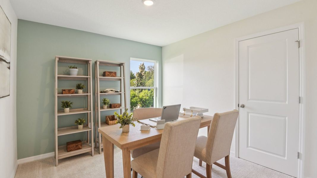Furnished interior in a model home at Brighton Park in Hudson (Image 24).