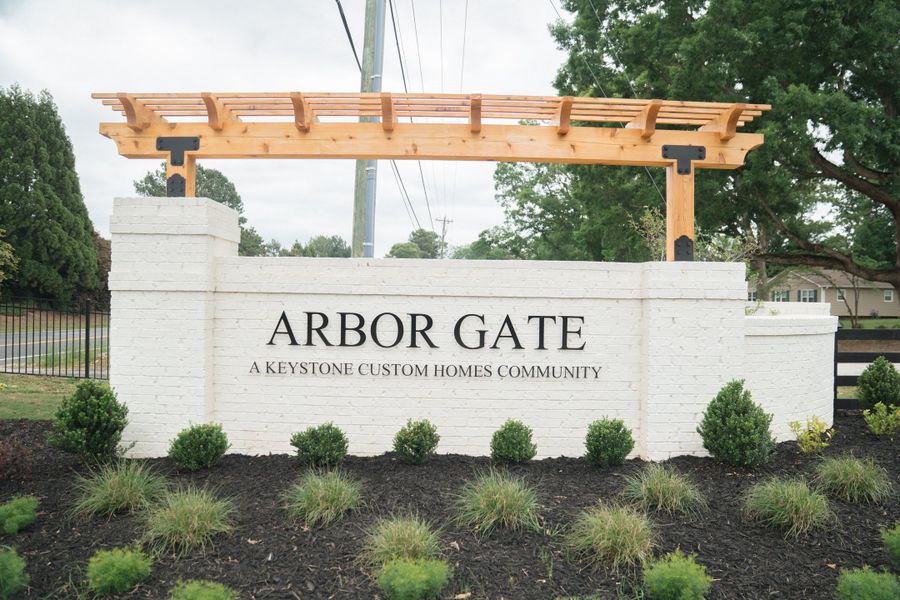 Entrance to the Arbor Gate community in Simpsonville, SC, featuring signage and landscaping (Image 10).