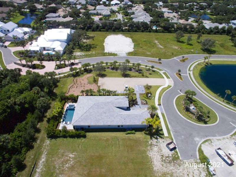 Aerial view of the The Strand community in Vero Beach, FL, showing layout and nearby surroundings (Image 43).