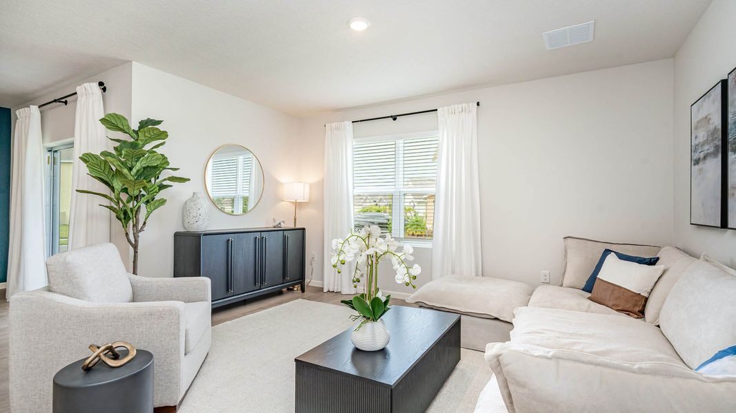 Furnished interior in a model home at Okeechobee Spot Lots in Okeechobee (Image 7).