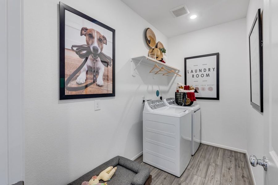 Furnished interior in a model home at Raburn Reserve 50s in Tomball (Image 50).