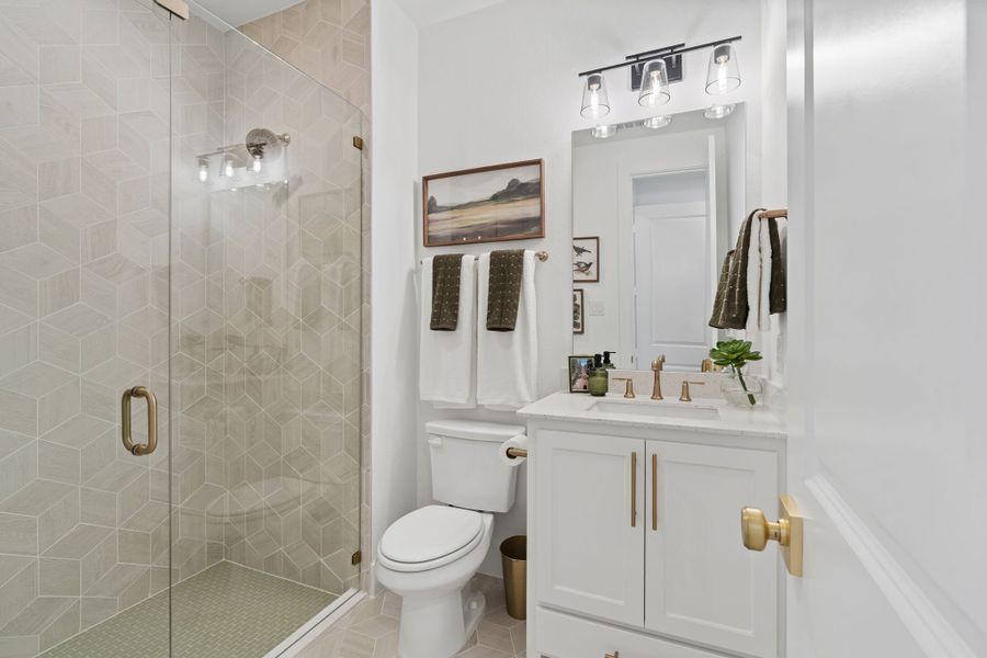 Furnished interior in a model home at Sweetgrass 65s in Haslet (Image 39).