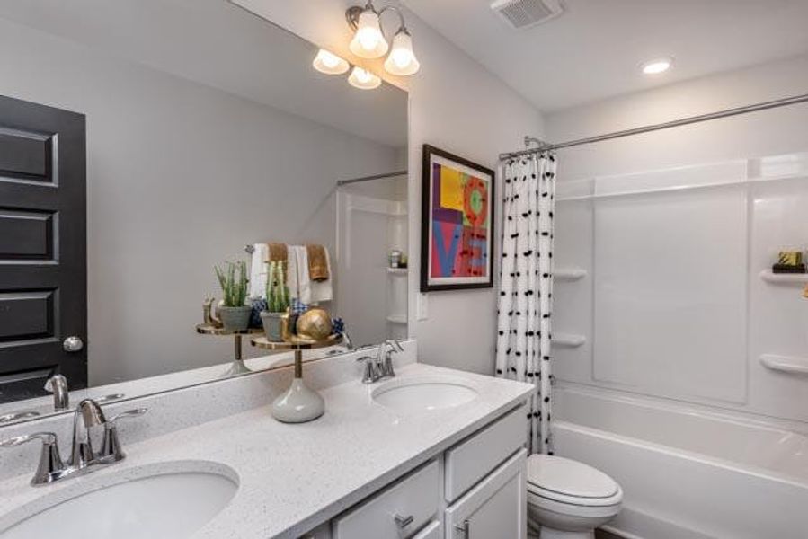 Furnished interior in a model home at Black Forest Pointe in Benson (Image 27).