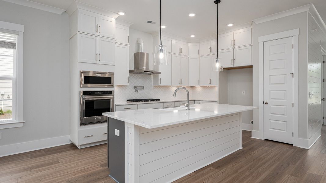 Furnished interior in a model home at Bayview Acres in Mount Pleasant (Image 3).