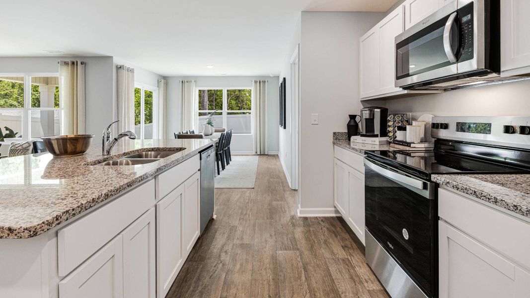 Furnished interior in a model home at Vineyard Trail in Jacksonville (Image 17).