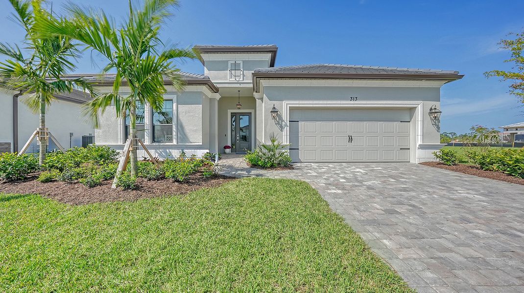 Front exterior of a home in the Vistera of Venice community, located in Venice, FL (Image 2).