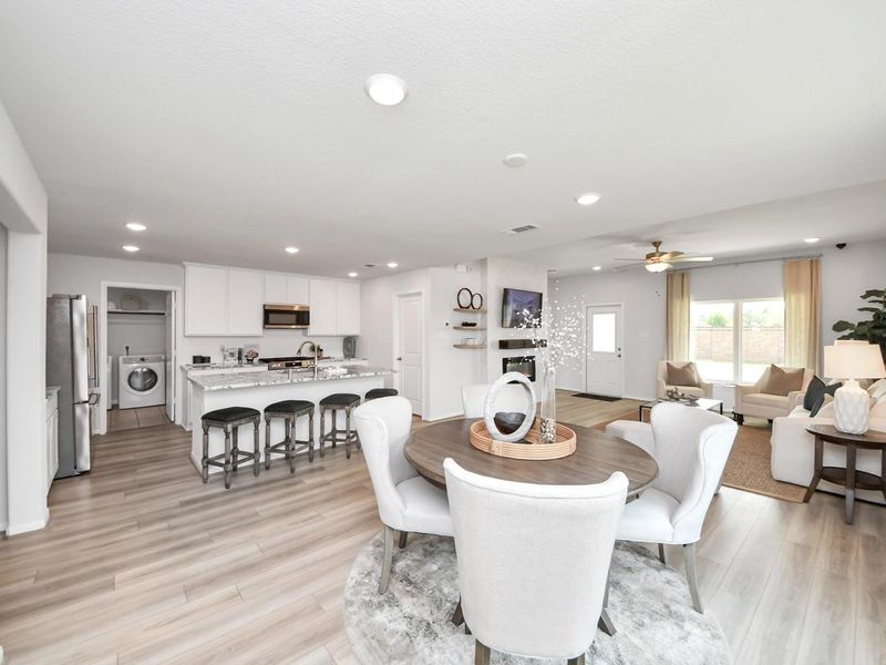 Furnished interior in a model home at Sunterra in Katy (Image 20).